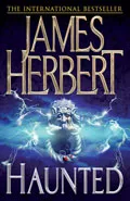 Haunted by  by James Herbert